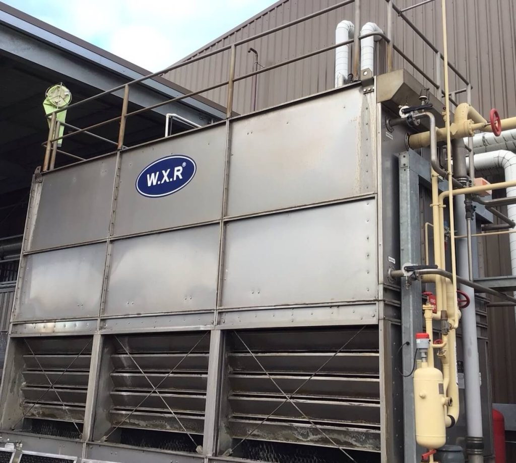 WXR cooling tower installed at an industrial facility providing heat rejection for the site’s cooling water system.